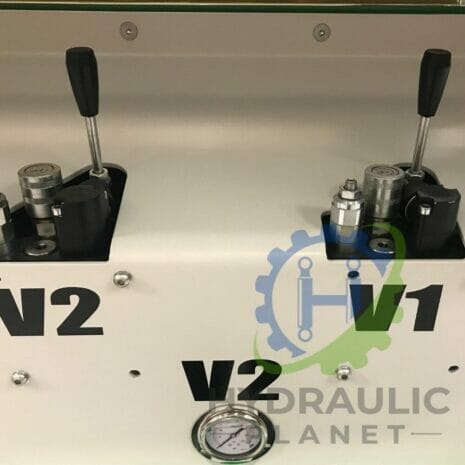 37 kW POWER UNIT-8 hydraulicplanet Close-up of a control panel labelled V1 and V2 with levers, hydraulic parts, a pressure gauge, the Hydraulic Planet logo, and the P350 HAND PUMP.